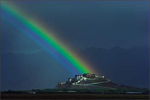 Rainbow over Potala Palace, by Galen Rowell